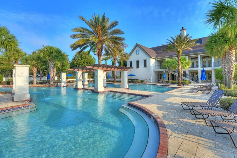 New homes in jacksonville fl. A new home community in jacksonville with a pool. AMELIA NATIONAL- Jacksonville, FL