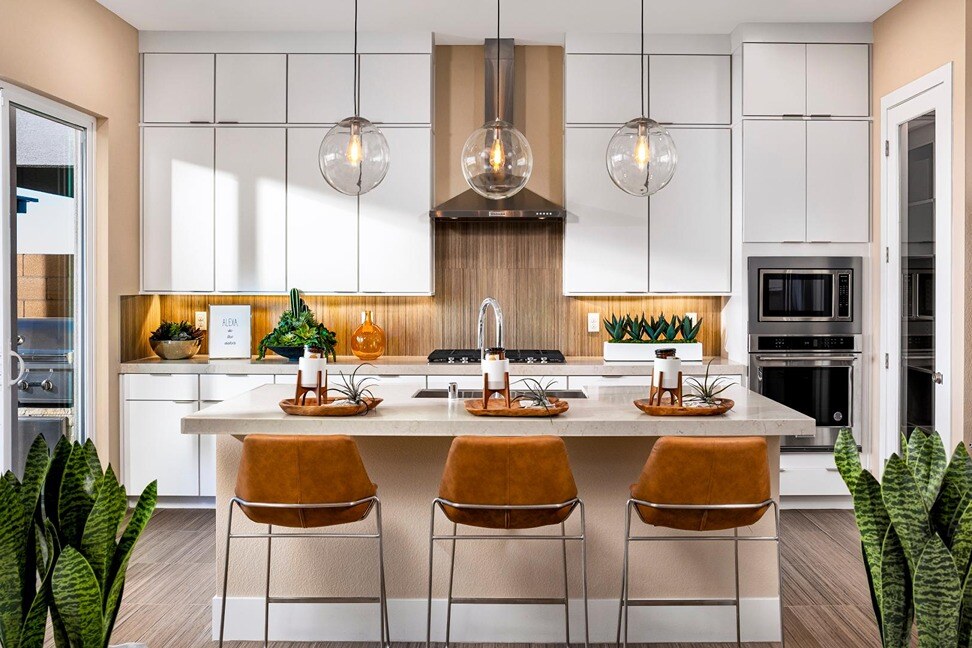 new homes in Las Vegas. A high-end kitchen with three stools. BERGAMO-Las Vegas, NV