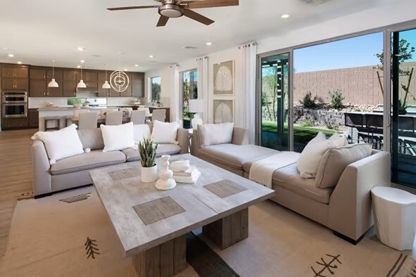 new homes in Las Vegas. A living room near opened sliding doors. LAYTON-Las-Vegas