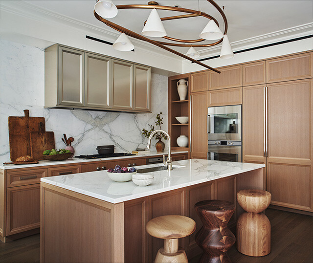 homes for sale in manhattan ny. The belnord in Manhattan. A kitchen with an island, stools, cooktop and more 