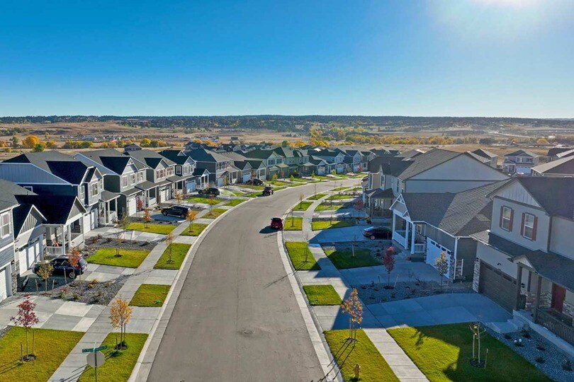 new homes for sale in denver. A street in a new home community in denver. Trails at Crowfoot-Denver, CO