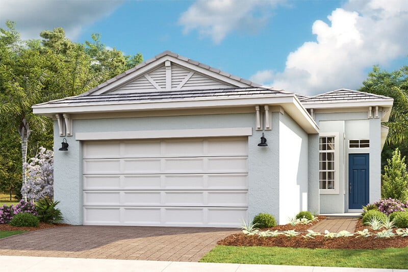 new homes in Port St. Lucie. A house with a garden surrounded by trees. Rivella